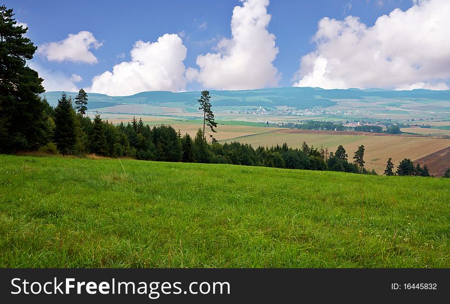 View of fields forest with mountain background , image was taken in Slovakia. View of fields forest with mountain background , image was taken in Slovakia