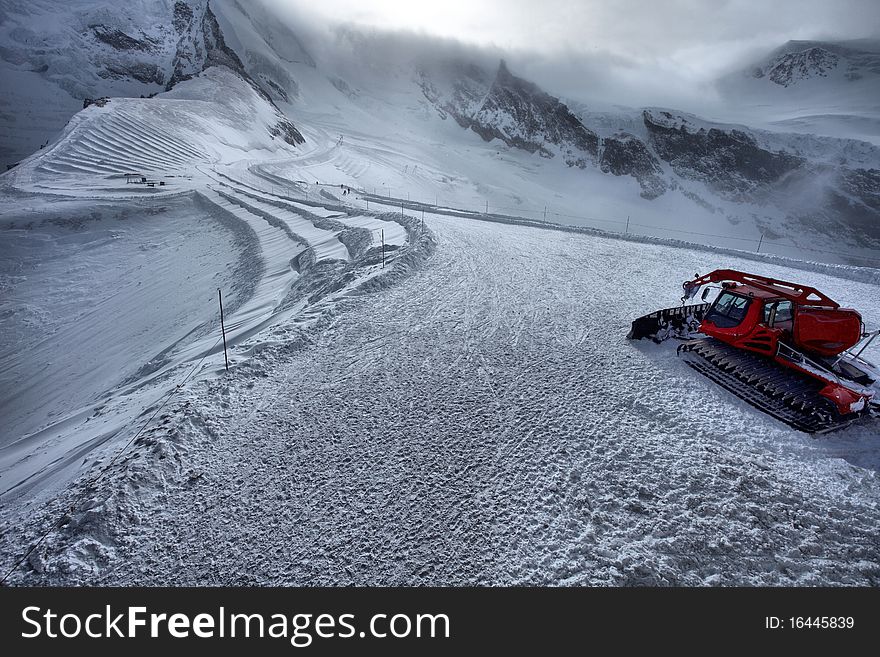 Snow grooming is the process to manipulate snow for recreational uses, usually using a snow groomer vehicle. Here is an example of a snow groomer in Saas Fee , Swiss Alps. Snow grooming is the process to manipulate snow for recreational uses, usually using a snow groomer vehicle. Here is an example of a snow groomer in Saas Fee , Swiss Alps.