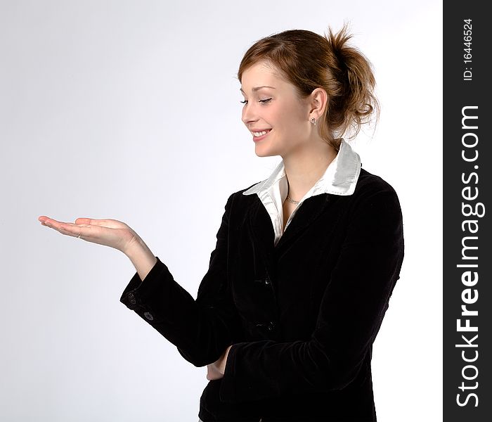 Happy young businesswoman, isolated on a white background