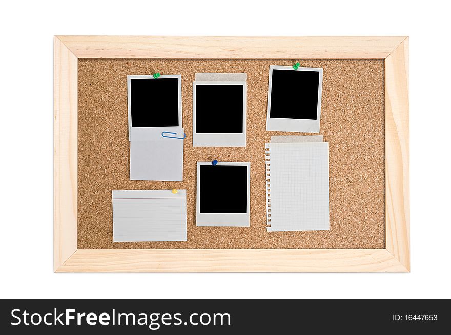 Corkboard with empty frame and notes