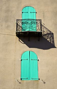 Shuttered Window With Ornate Balcony Royalty Free Stock Photo