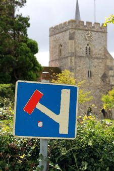 Dead End Signpost In Front Of A Church Royalty Free Stock Image