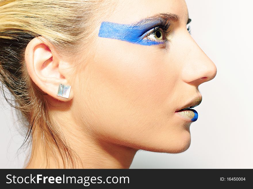 Model with art make up on white background. Model with art make up on white background