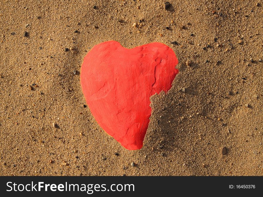 Heart shape in sand on a beach