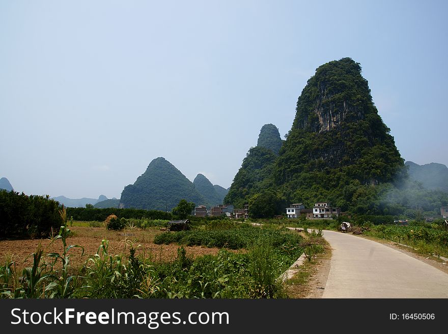 A mountain and rural Landscape of Yangshuo, China. A mountain and rural Landscape of Yangshuo, China