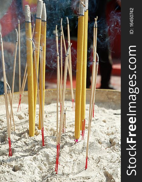 Close up of joss stick at the temple