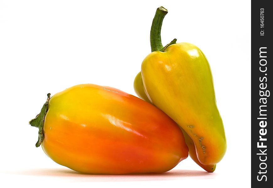 Colorful fresh peppers isolated on white background