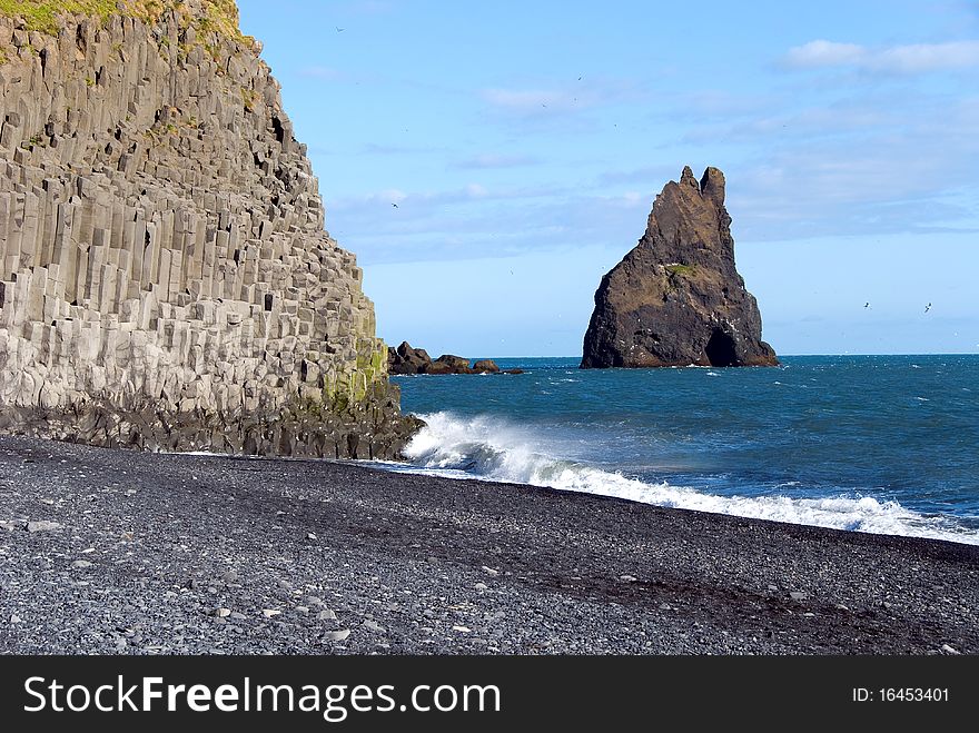 Jagged cliff on the beach in Iceland. Jagged cliff on the beach in Iceland