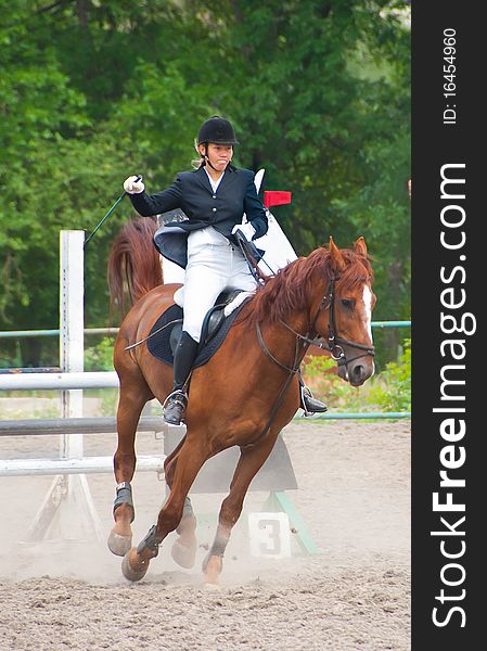 Jockey riding a horse in competition