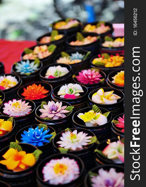 Rows of handcrafted soaps in the shape of flowers. Rows of handcrafted soaps in the shape of flowers