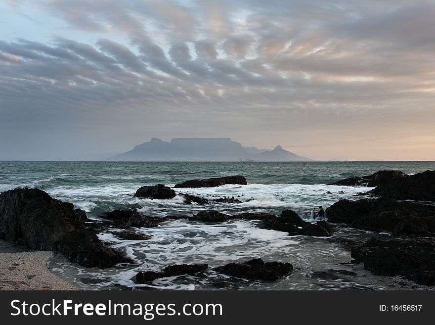 Table Mountain at sunset, under clouds