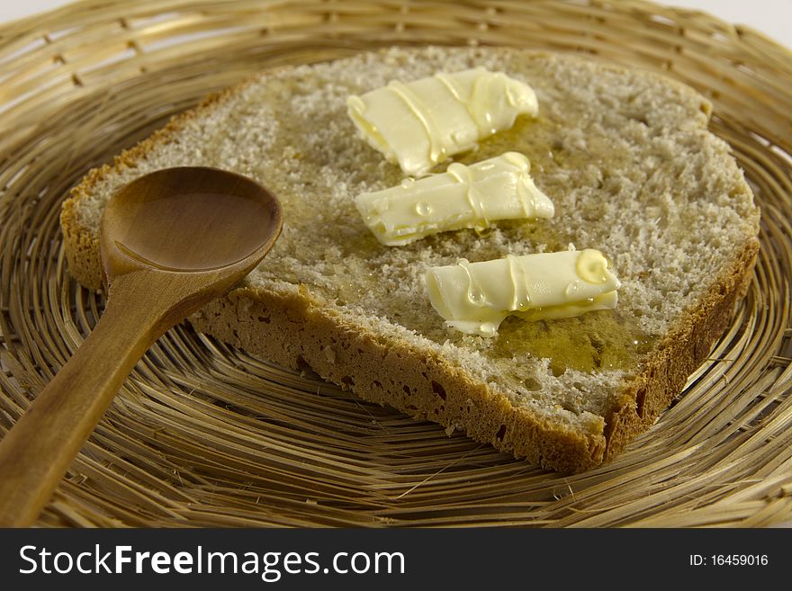 Bread slice with butter and honey. Bread slice with butter and honey