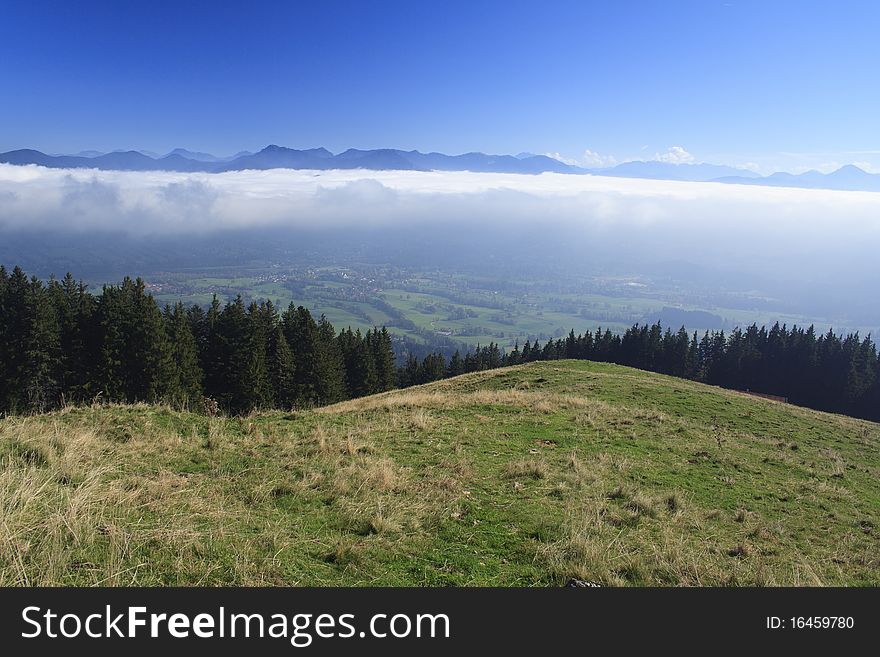 View from the mountain with clouds and blue sky