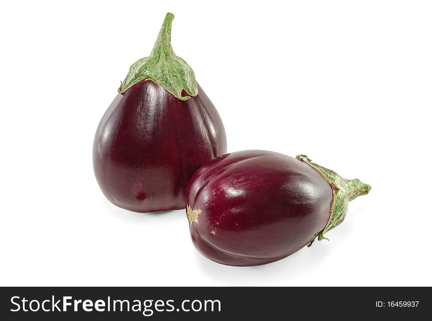 Ripe eggplants are isolated on a white background