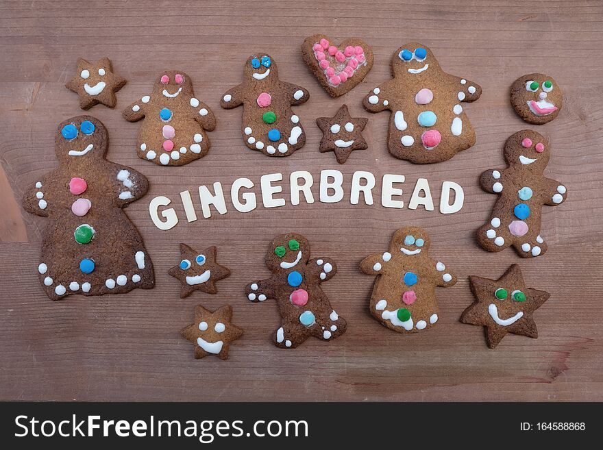 Homemade gingerbreak cookies with wooden letters text