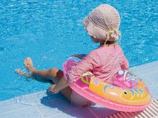 Little Girl With Inflatable Circle At Pool Stock Photo Little Girl With Inflatable Circle At Pool Stock Photo