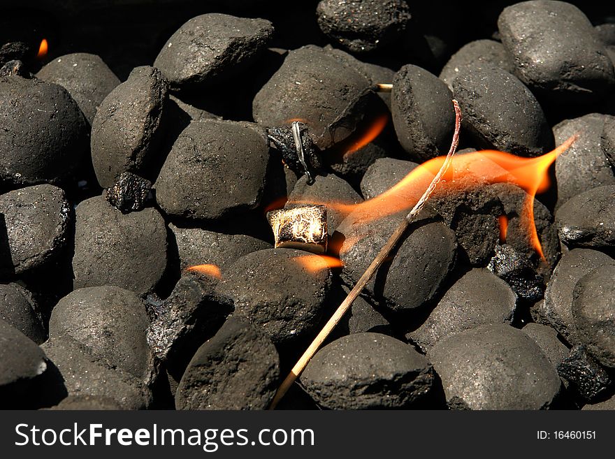 Kindling of coals for preparation of a shish kebab