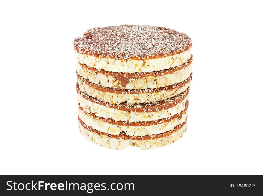 Stack of round crispbread with chocolate isolated on white