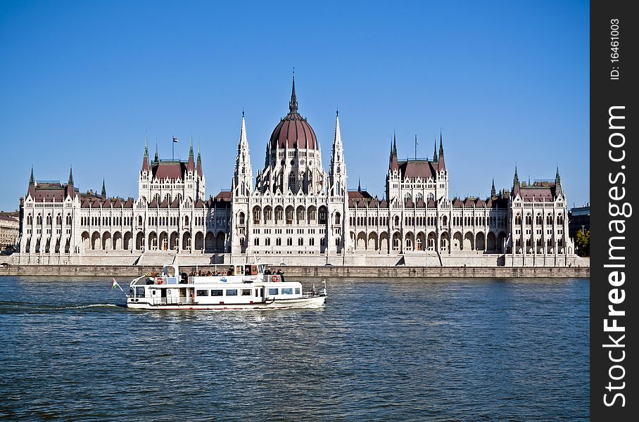 Hungarian Parliament in a sunny day with a ship. Hungarian Parliament in a sunny day with a ship