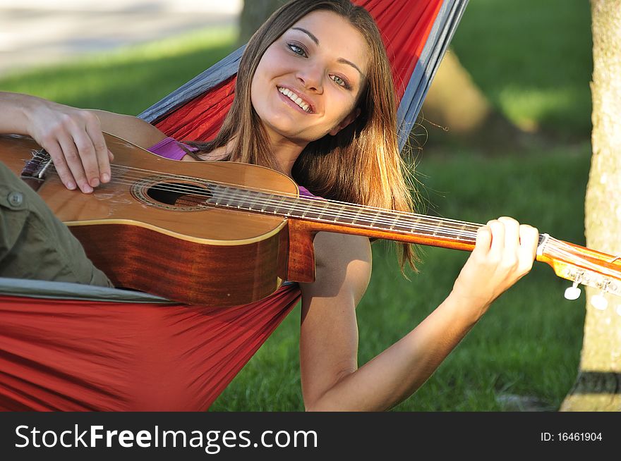 Girl playing guitar