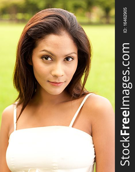 Outdoor portrait of attractive woman. Outdoor portrait of attractive woman