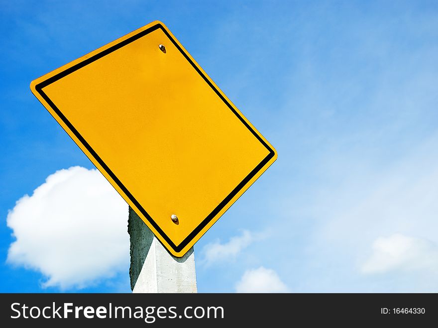 Blank yellow sign on blue sky background
