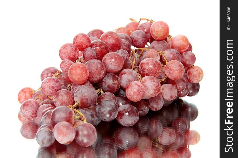 Red grapes on a white background are isolated. Red grapes on a white background are isolated.