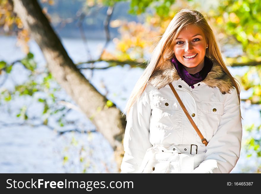 Caucasian young adult blond woman outdoor fall time