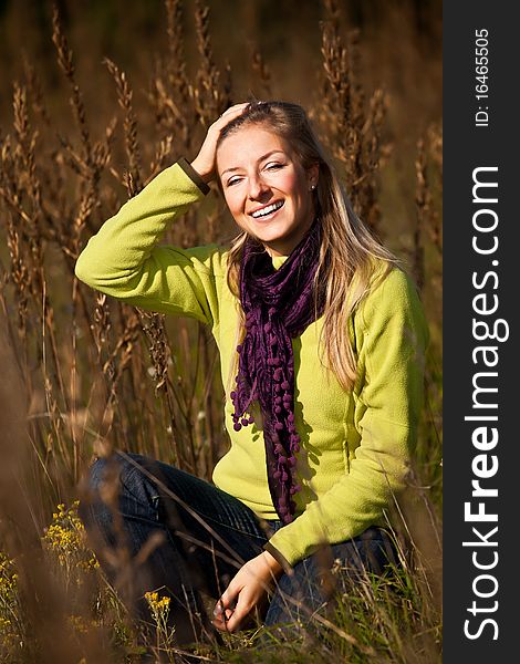 Caucasian young adult blond woman outdoor fall time