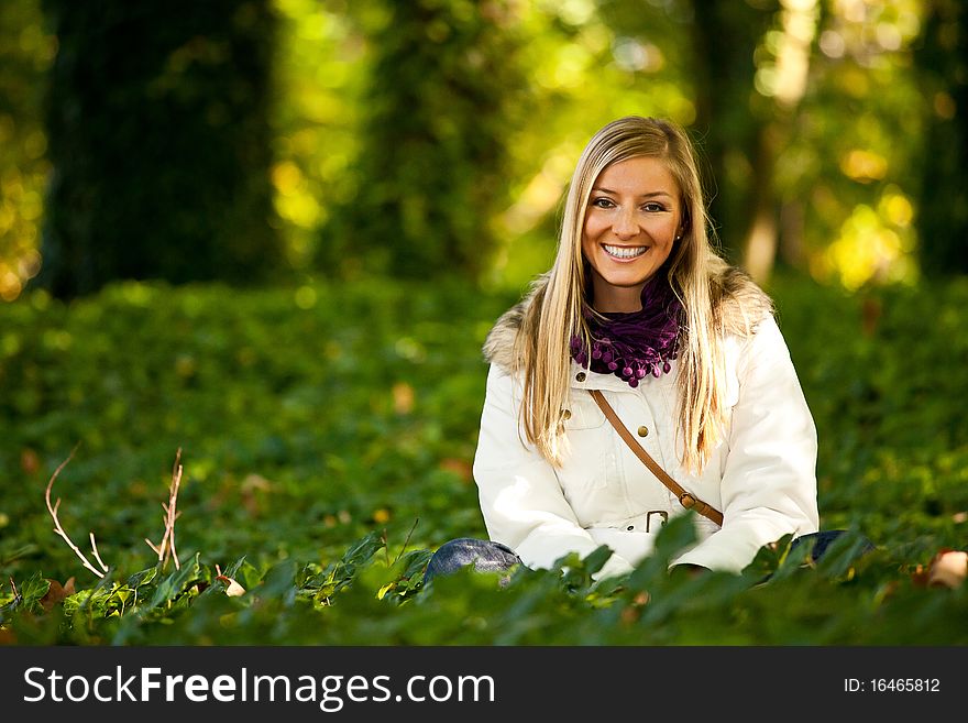 Caucasian young adult blond woman outdoor fall time