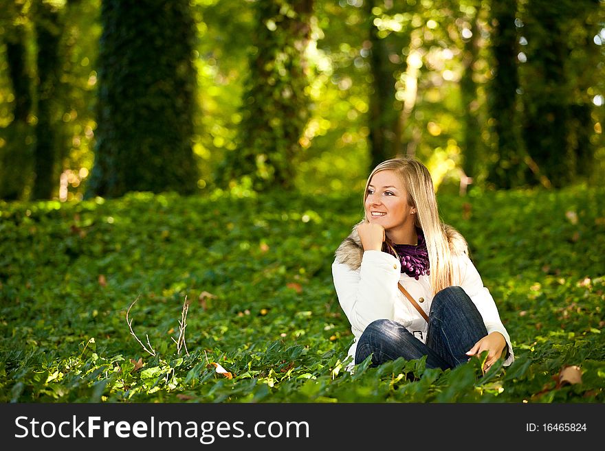 Caucasian young adult blond woman outdoor fall time