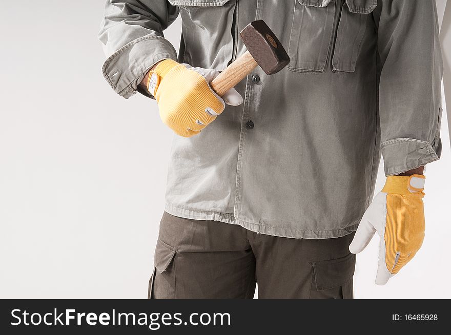 Close-up of a man with hammer. Close-up of a man with hammer