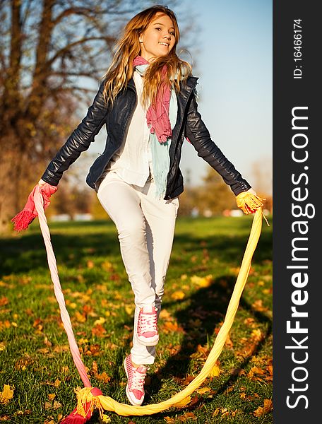 Beautiful young smiling jumping girl. Beautiful young smiling jumping girl