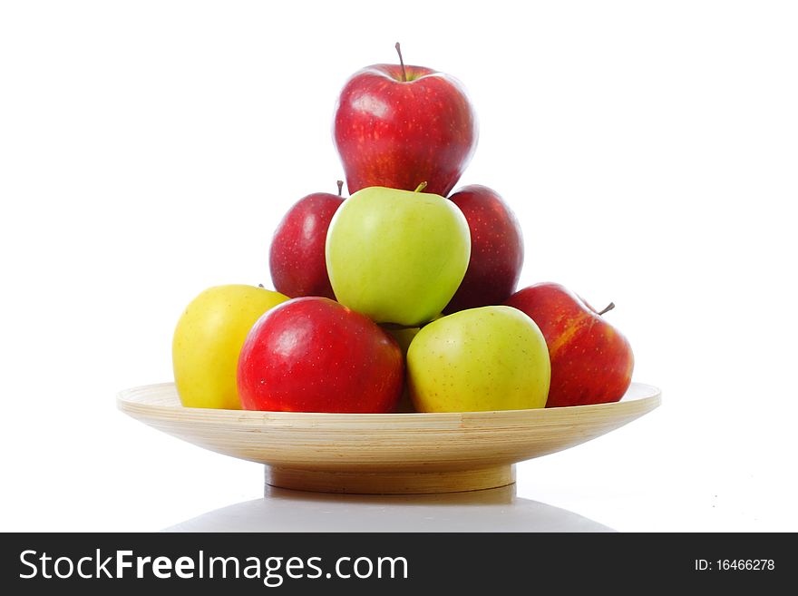 Plate with colorful fresh apples