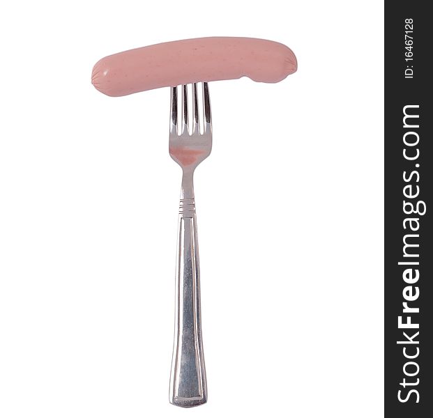 Sausage on a fork on a white background