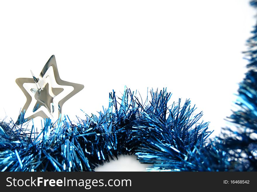 Christmas tinsel with silver star isolated