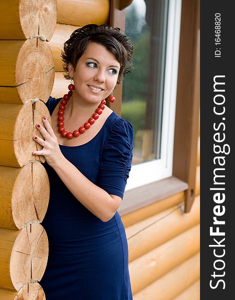 Girl standing on a veranda. Girl standing on a veranda