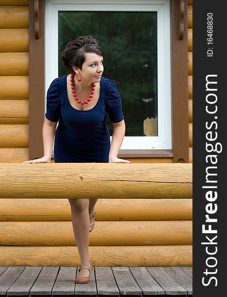 Girl standing on a veranda. Girl standing on a veranda