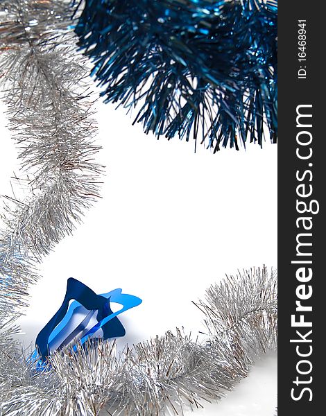 Christmas tinsel - silver and blue - on white background. Christmas tinsel - silver and blue - on white background
