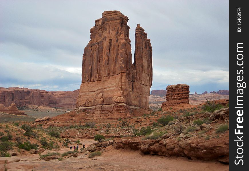 Park Avenue Trail, a 1-mile trail that follows the bottom of a canyon at the feet of the gigantic monoliths of Arches National Park. Park Avenue Trail, a 1-mile trail that follows the bottom of a canyon at the feet of the gigantic monoliths of Arches National Park.