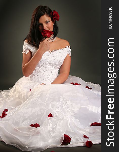 young bride with red roses. young bride with red roses