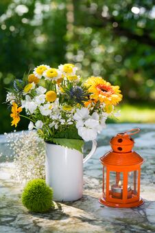 Summer Flower Bouquet In A Old Enamel Cup Royalty Free Stock Images