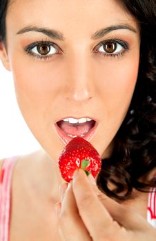 Woman Eating Strawberry Stock Photos
