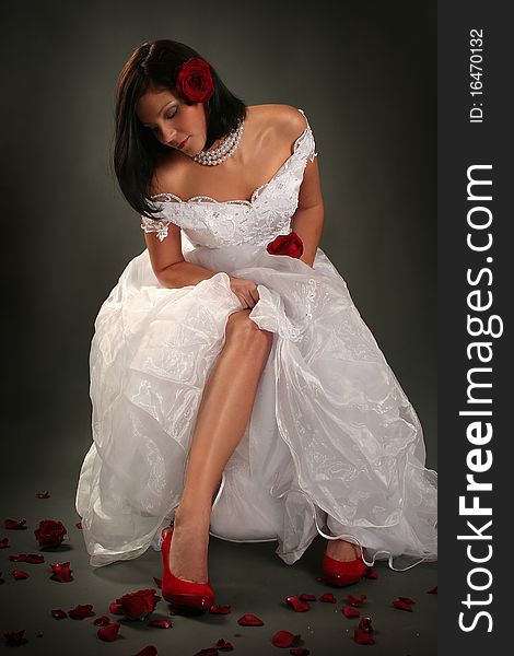 young bride with red roses. young bride with red roses