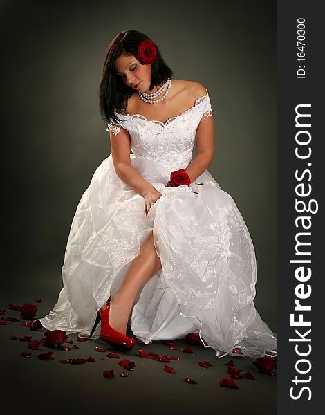 young bride with red roses. young bride with red roses