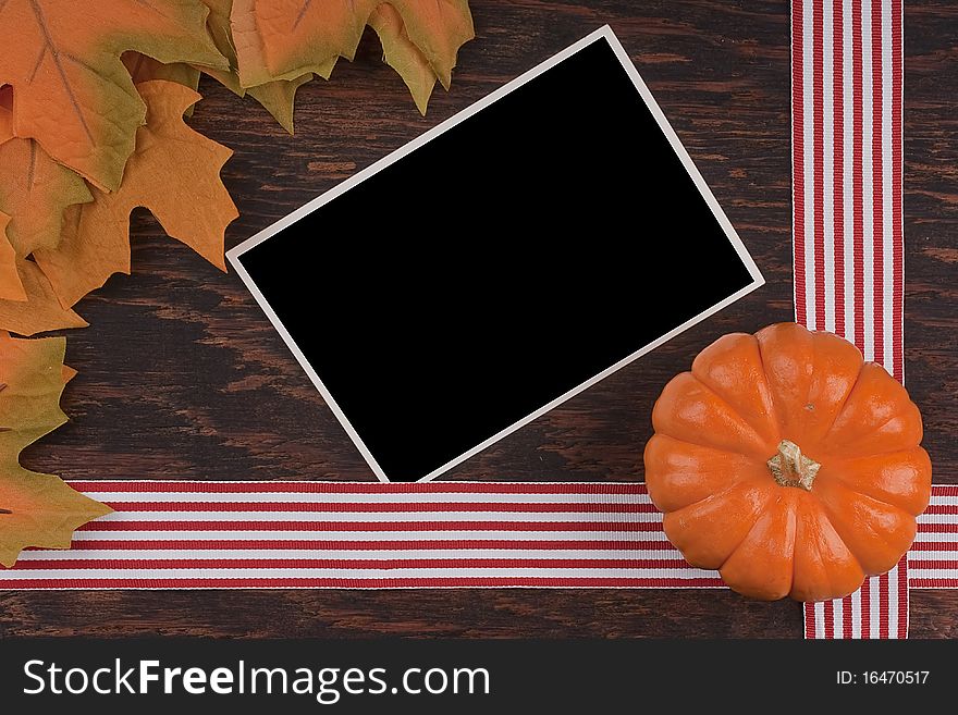 Small orange pumpkins symbolising autumn holidays and used in decorative works.