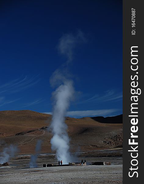 Erupting geysers in the Chilean geysers of El Taito