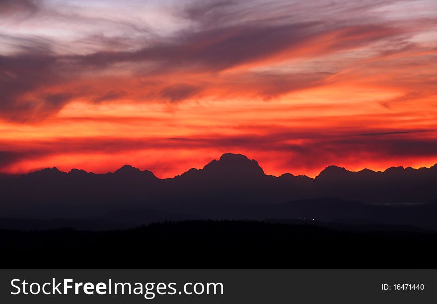 Grand Tetons mountain range in sun set