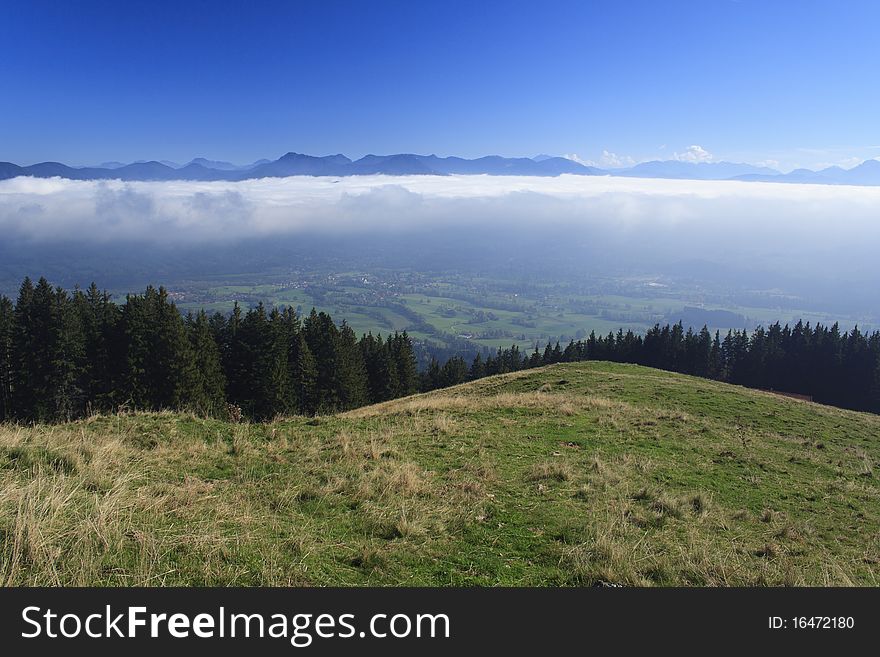 View from the mountain with clouds and blue sky