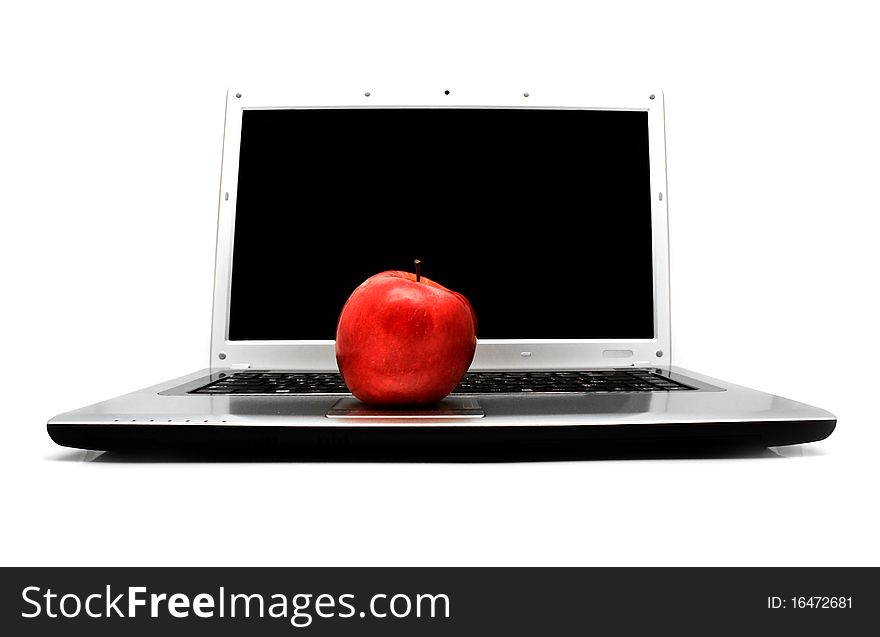 Notebook with a red apple on a white background